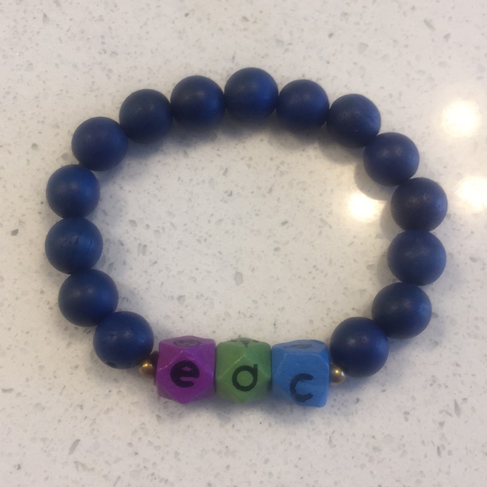 Electric Daisy Carnival blue bead bracelet